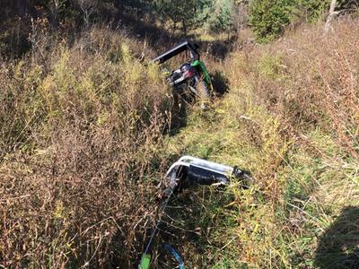 hard to see the cable. The passenger seat was removed for battery access and was useful to cover the cable for safety.