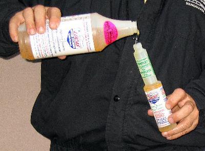 Use the small bottle to measure.