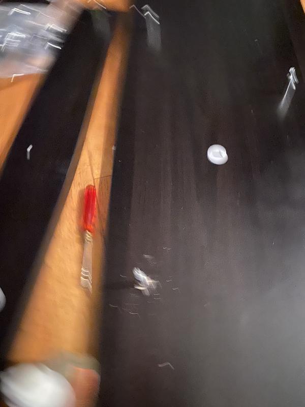 Some holes not pre driven, screw would not stay in had to leave it out, top of desk scratched up