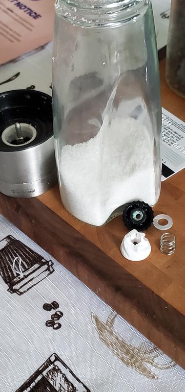 Broken ceramic piece and you can see how much of the original salt is left in the shaker in the last pic