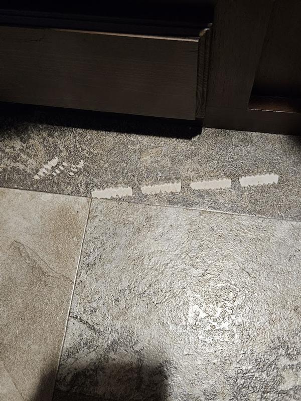 Burned through first layer of camper's vinyl floor