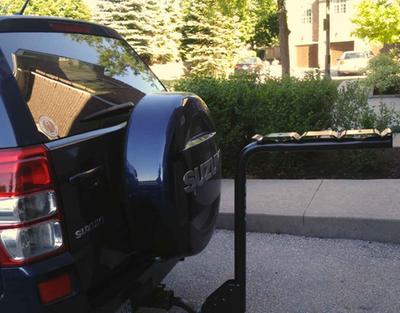 Rack Installed on SUV with about 6" clearance to spare tire.