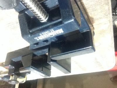 Two cracks at bottom of clamp base