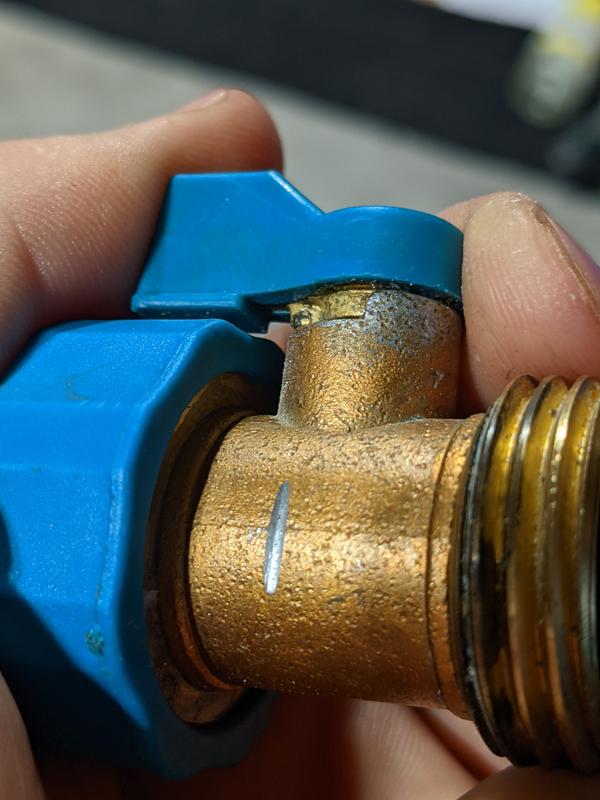 Filed to show diecast body. Note that the plating is so thin that it has worn off from handling of the valve handle in just two years.