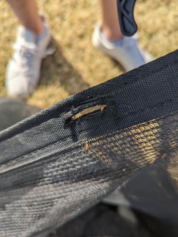 The original net had this hemmed bottom, which is no longer part of the net.