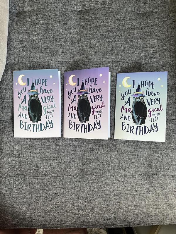 Same card printed 3 different ways one after the other. The middle one is corerct.