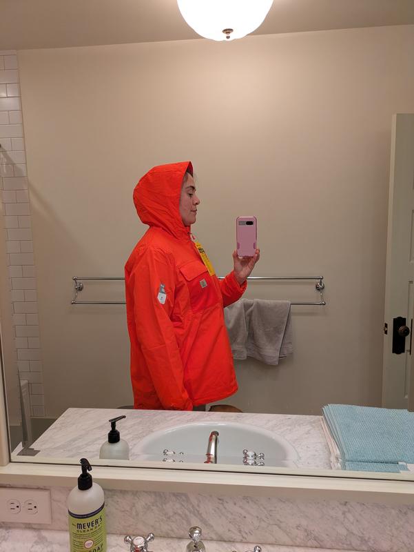 The hood is too shallow for hair up. When walking it pulls back and exposed my forehead.