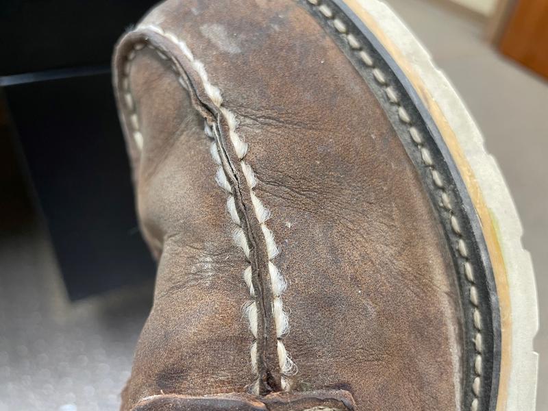 Stitching on this boot is becoming loose and frayed.