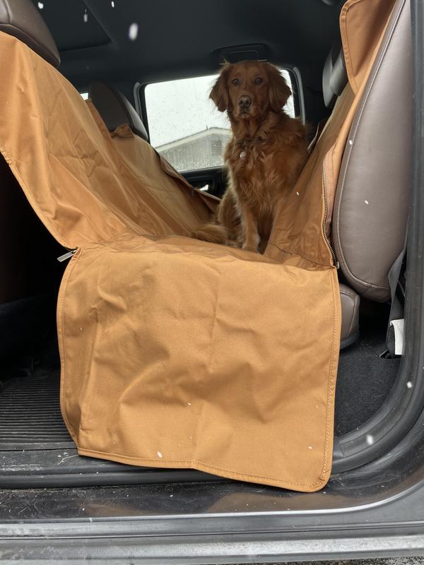 My dog is finally allowed in the pickup, the cover seems to  the perfect ticket