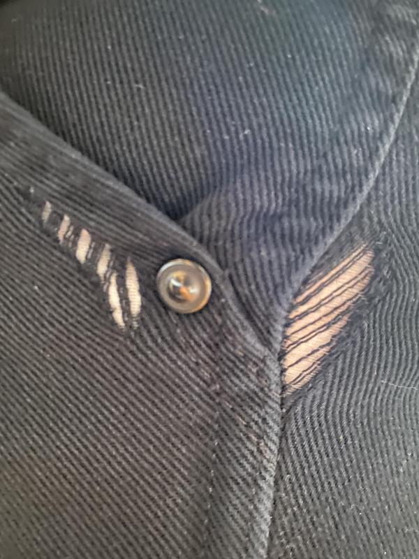 The rip has since run down the seam on both sides and growing.