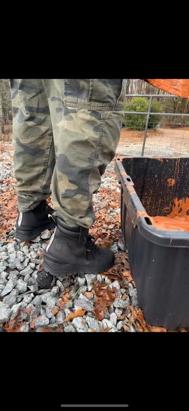 Mud dyeing t-shirts.