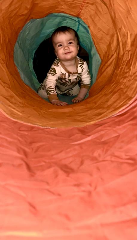 Tunnel play in his wildly cute pjs!