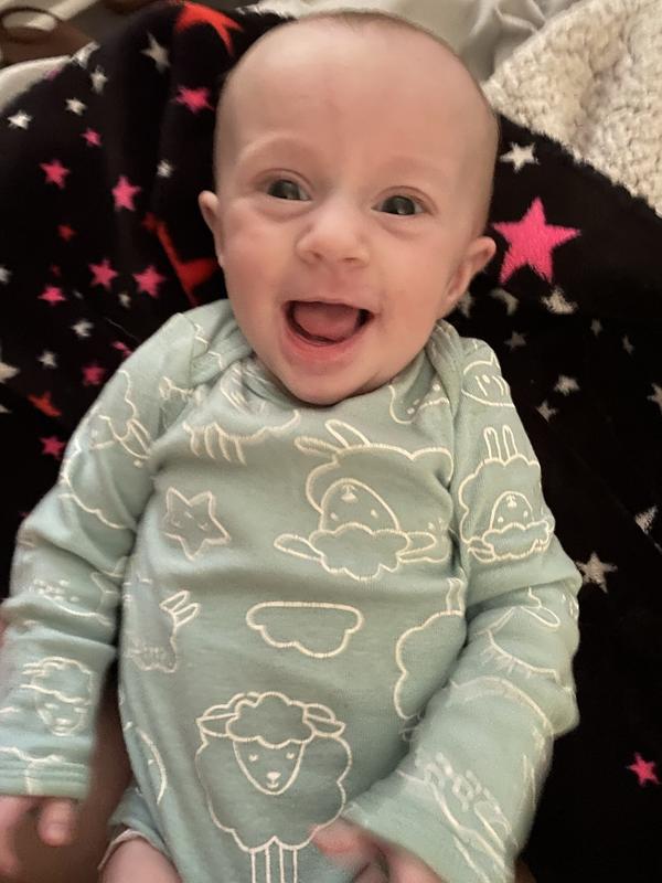 Happy in her new onesies!