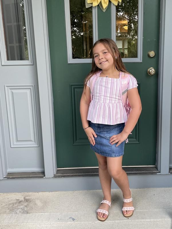 My daughter loved this for her first day of school outfit! Carters top and bike shorts as well!