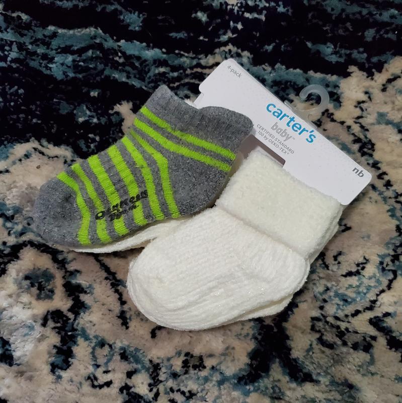 12-24m (grey&green) sock next to NB sock