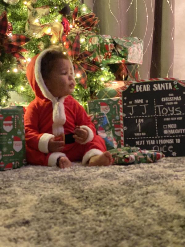 His warm and cute santa pj’s