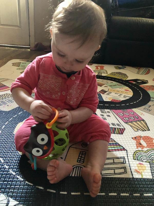 Loves playing on her new mat!