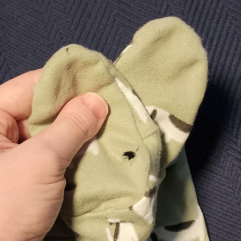 Onesie with holes in the feet.