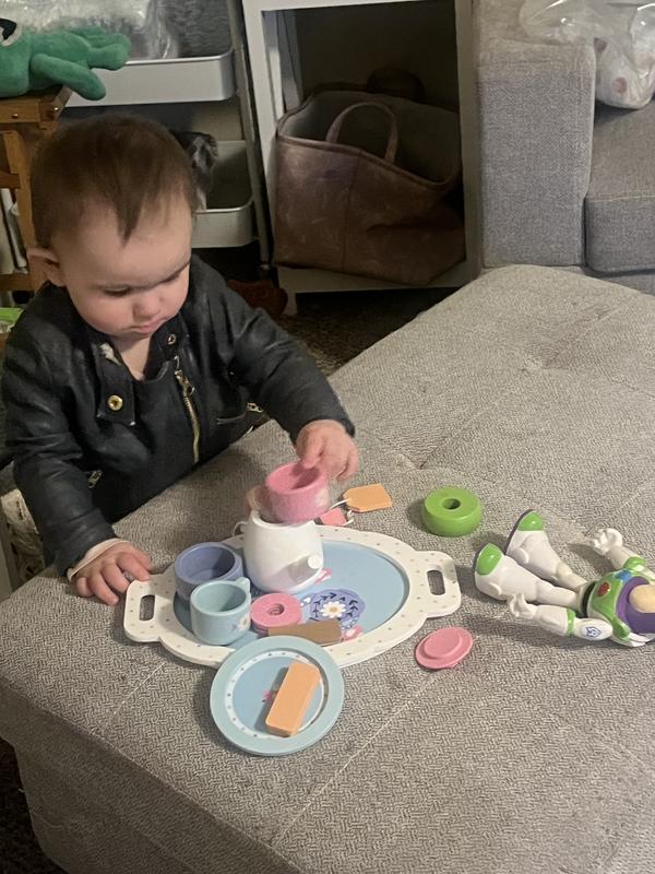 My little one checking out the tea set