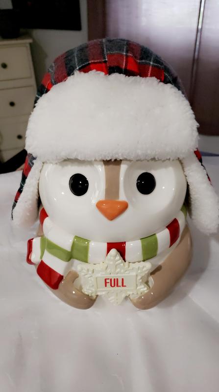 It currently resides on our cookie jar. It was too cute to put away