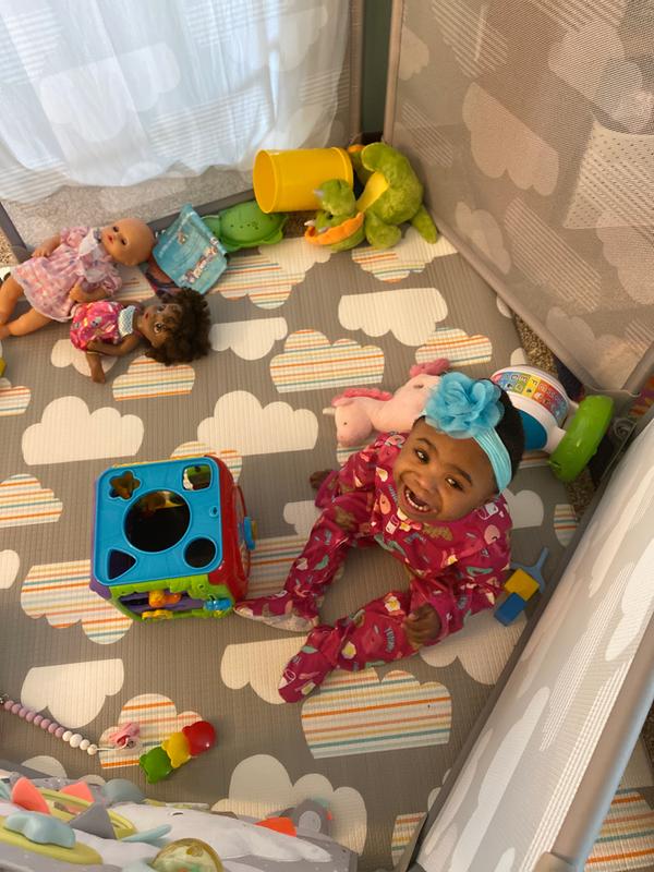 Loving her new play pen. Smile says it all :)