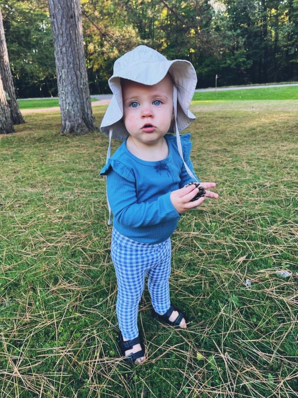 So cute while our little collects her pine cones!