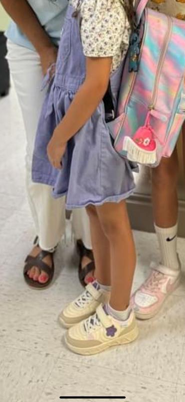 She absolutely loves her new shoes!