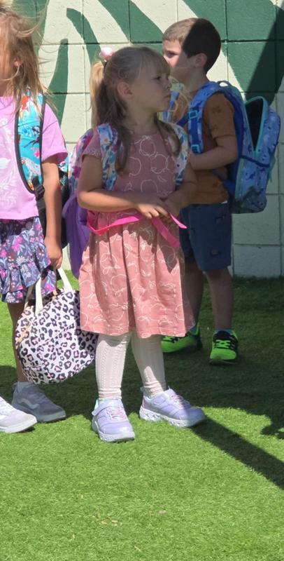 My 5 year old in leggings and a dress from Carters. Shes on the shorter side for her age.