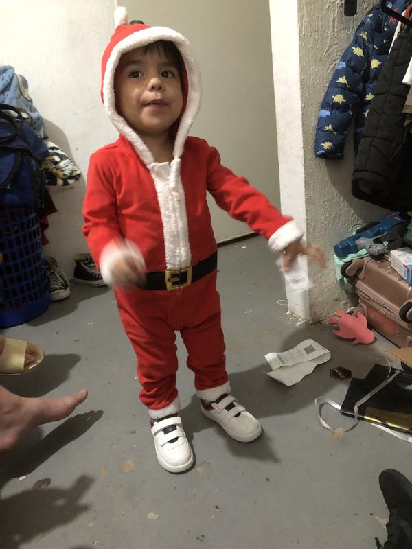 My son of Santa Claus Happy with your new clothes
