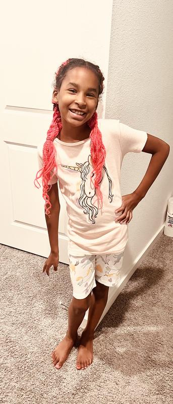 Unicorn pajamas … one of two pairs which are packaged together and the child can mix and match. They fit nicely and  the quality of the material is soft and  comfy. Carter’s pajamas  make going to bed a happy time at our house.