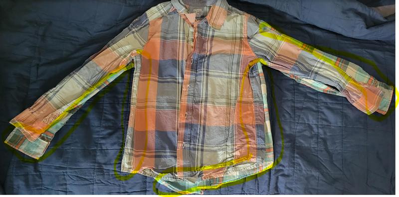 Orange plaid shirt is a new Carters size 10. Shirt under it is a size 8. Shrank after 1 cold wash.