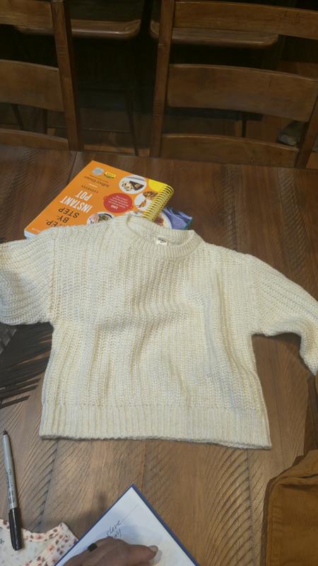 such a beautiful creme color with gold in lay. im purchasing it again. its soft too. love it love it