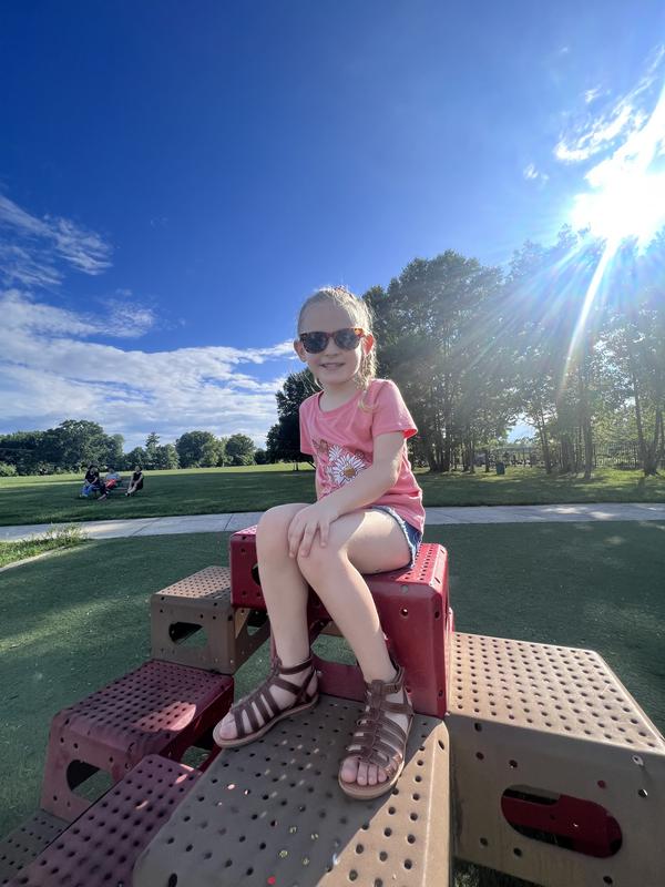 Izzy at the park with her new sandals!