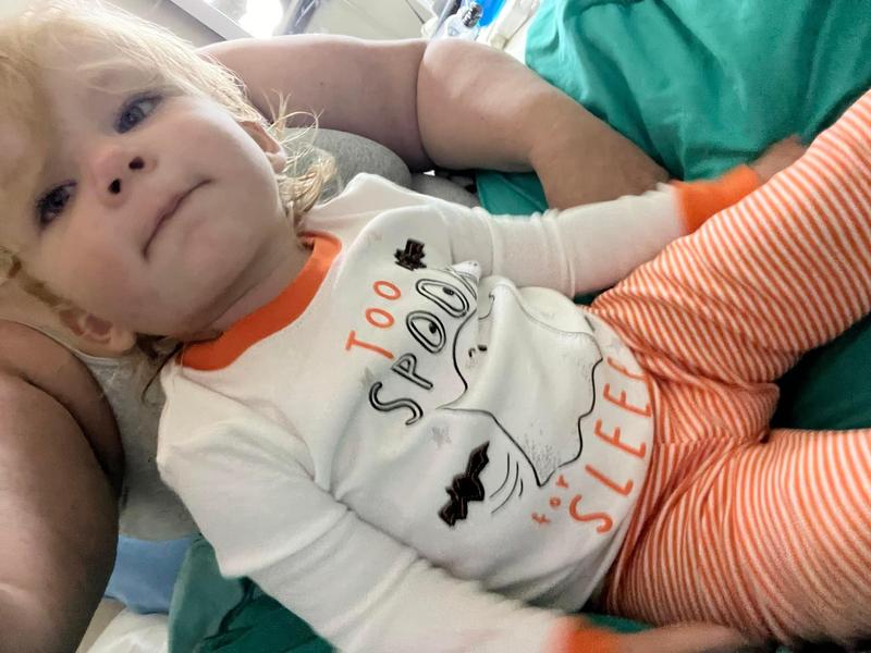 Relaxing in her new Halloween pajamas