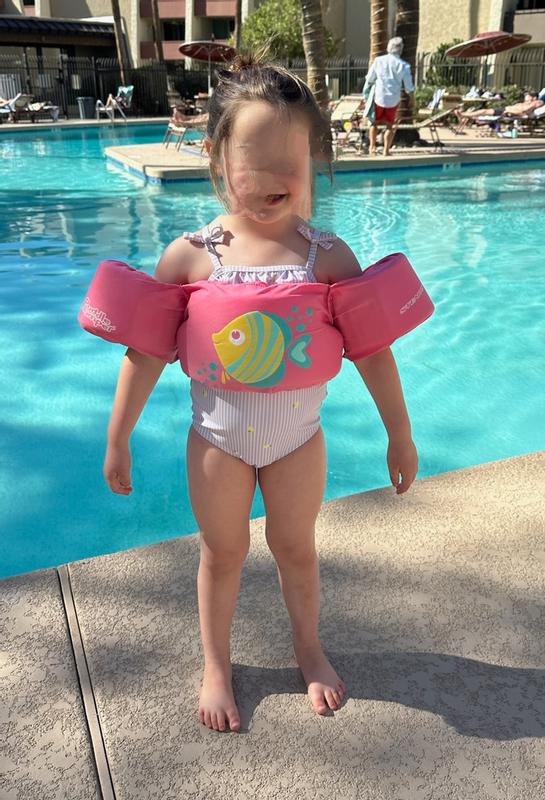 Cute suit. Purple stripes with yellow lemons. Fits well but had sized up per prior reviews.