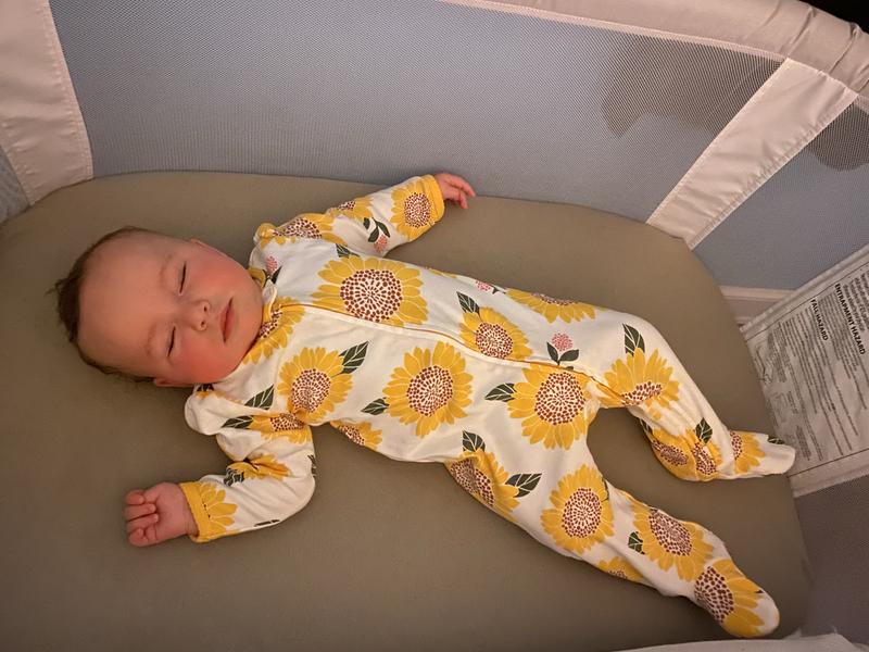 Someone loves her new pjs.