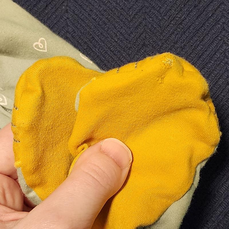 Onesie with holes in the feet.