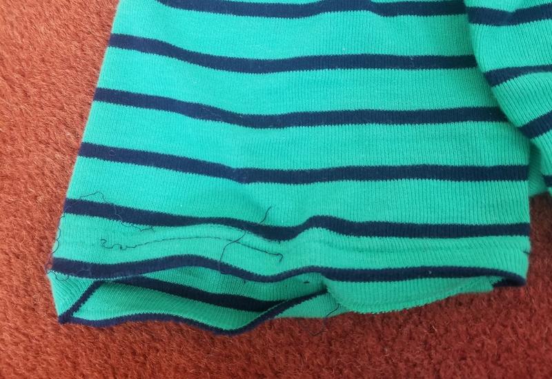 Green shorts which has white tee (crocodile applique)