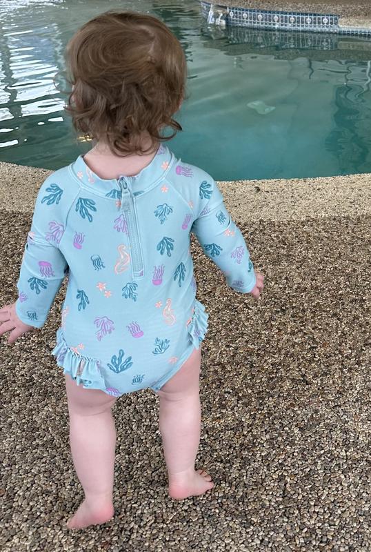 My daughter in this lovely rash guard!