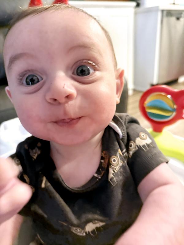 His new carters onsie. Size 6 months.