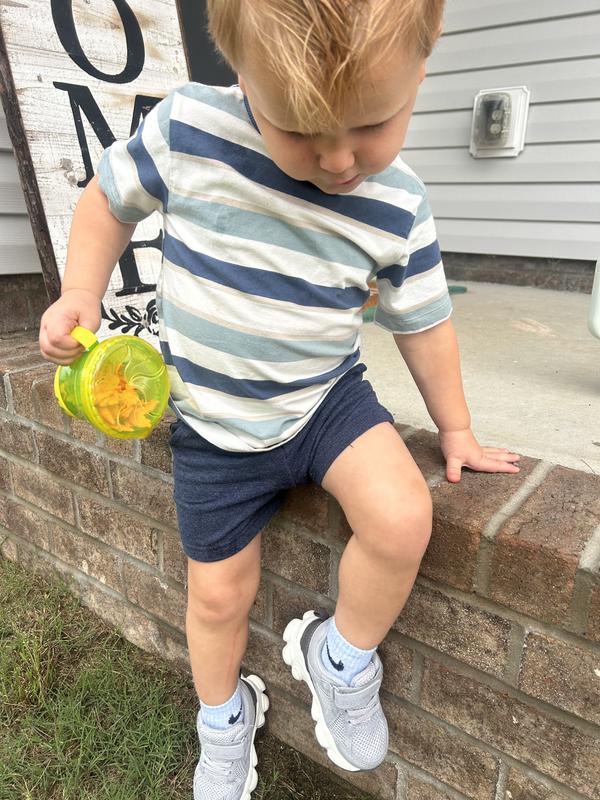 Love the way he is looking at his shoes.