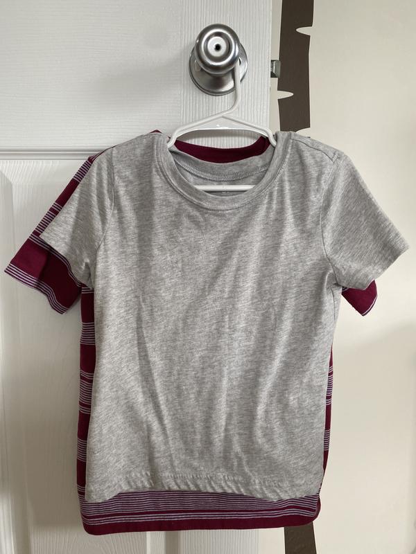 Carters brand size 6 boys shirt and the gray shirt is a size 6/7 boys shirt that runs very small.