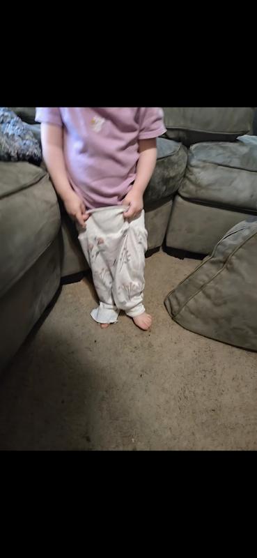 She keeps trying to pull them back up.