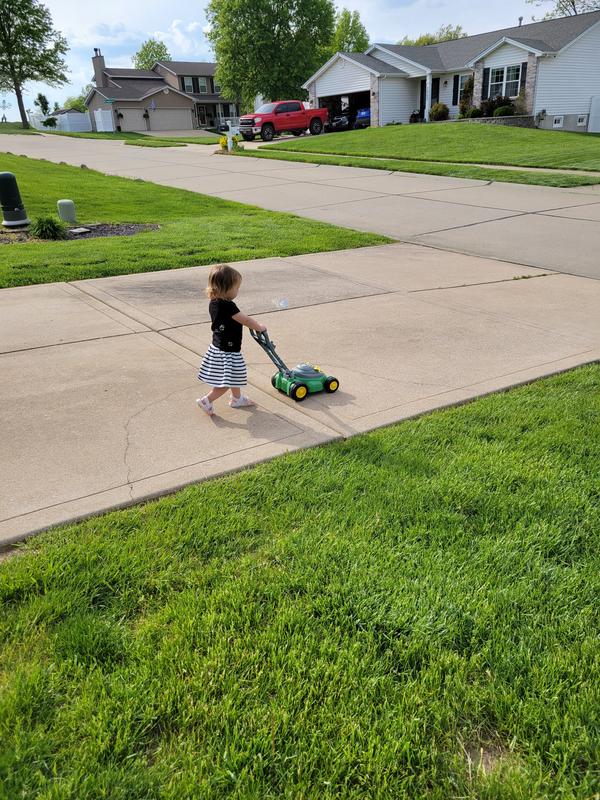 Blowing bubbles while wearing my new outfit