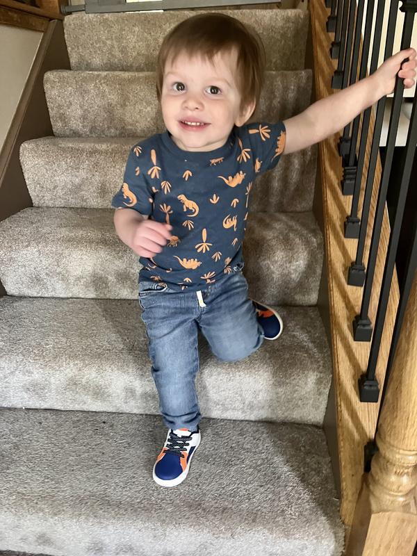 Cutie with his new sneakers!