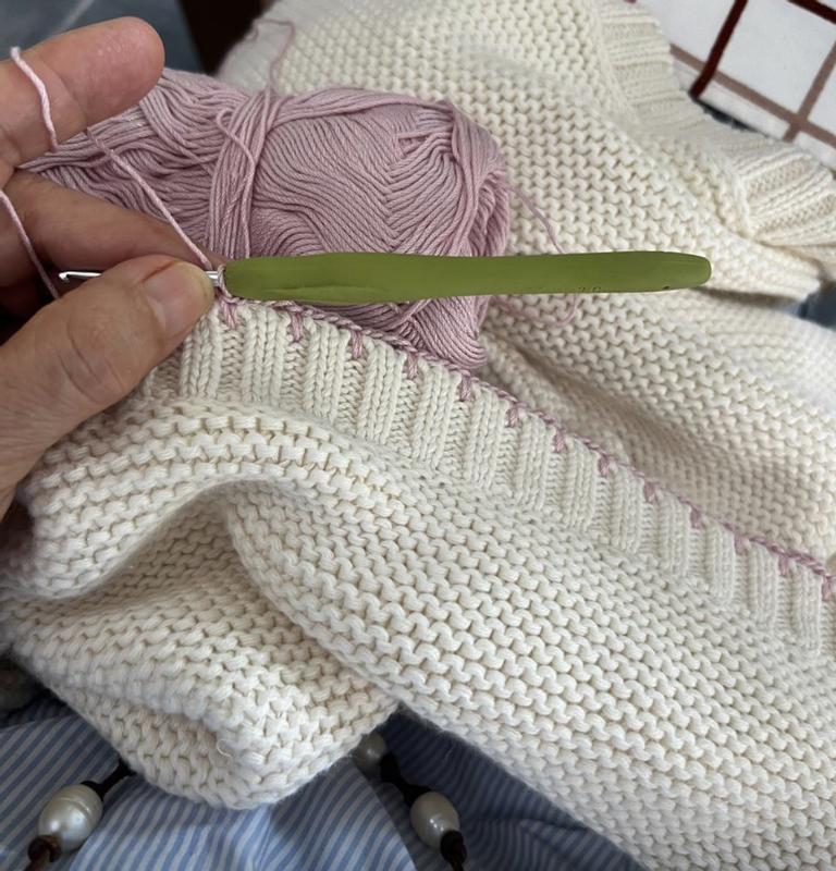 I crochet knit the border in sweet baby shades.