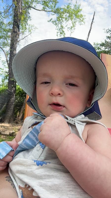 Photo of the outfit as well as carters bucket hat.