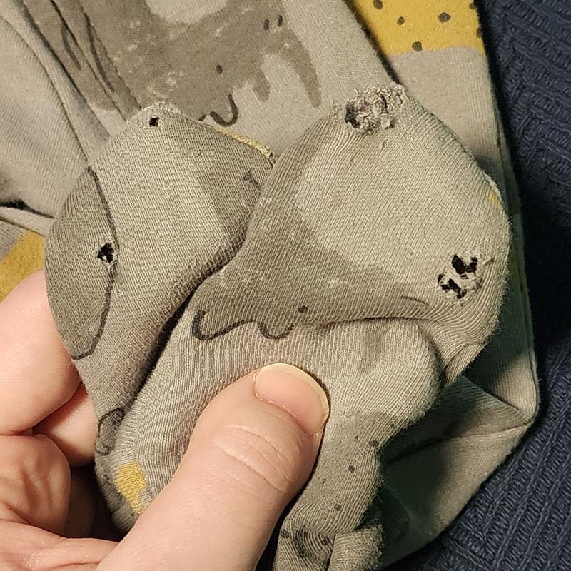 Onesie with holes in the feet.