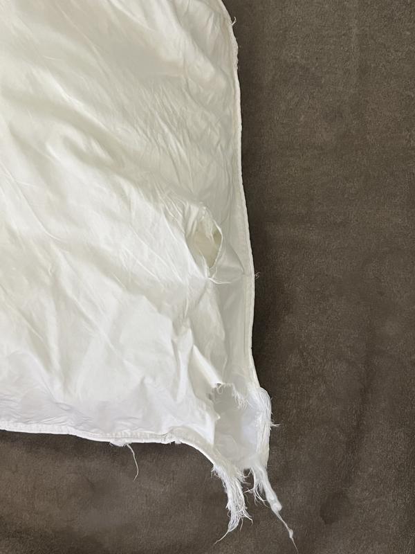 Holes in pillow after washing.