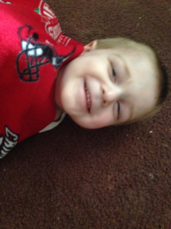 My youngest wrapped in a blanket that was dried with an Arm & Hammer Essentials dryer sheet.